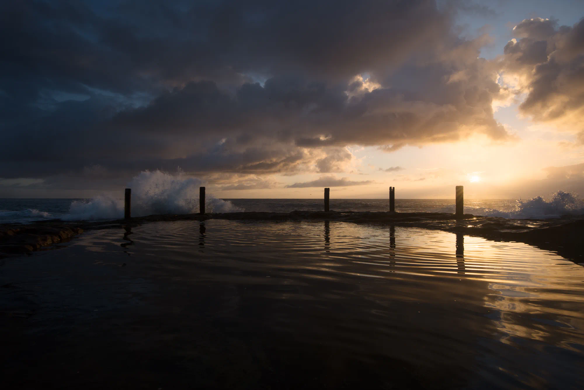 dramatic sunrise at rockpool